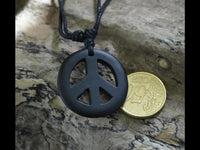 Load image into Gallery viewer, Kette Sono Holz Peace Anhänger schwarz 3,3 cm verstellbar Baumwollkette
