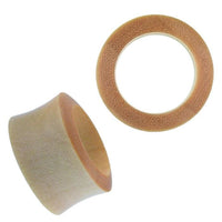 Cargar imagen en el visor de la galería, Two beige Holz Flesh Tunnel Krokodilholz hell leicht konvex double flared sit on a white background—one upright with its circular opening visible, the other flat, showing its inner hollow center.
