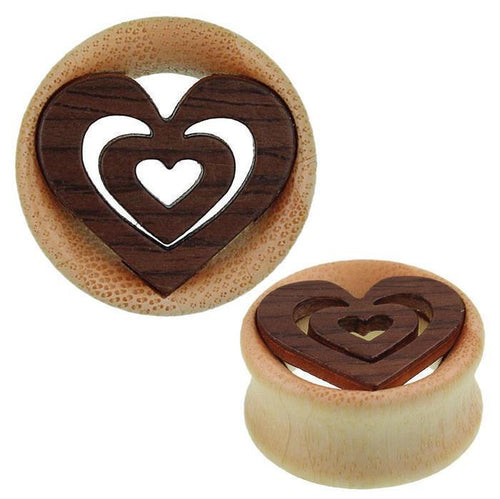 The Holz Tunnel Plug Herzen dunkel hell Maserung features two wooden plugs with a light wood base and dark wood heart inlays, perfect as tribal expandern piercing schmuck for stretched ears.