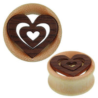 Load image into Gallery viewer, The Holz Tunnel Plug Herzen dunkel hell Maserung features two wooden plugs with a light wood base and dark wood heart inlays, perfect as tribal expandern piercing schmuck for stretched ears.
