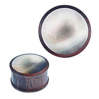Load image into Gallery viewer, The Sonoholz Plug Black Shell Perlmutt Inlay schillernd Tunnel Tribal Expander Ohrplug, a round tribal plug with an iridescent inlay, is shown from the side and top view against a white background.
