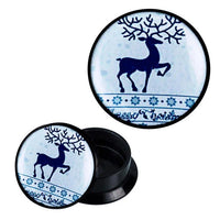 Load image into Gallery viewer, A black, circular Schraub Plug Acryl Rentier Weihnachten container with a blue-white reindeer and snowflakes design—ideal for storing your Ohrschmuck. The lid is open, displaying the inside of the container.
