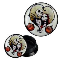 Load image into Gallery viewer, The Schraub Plug Acryl features a cartoon-style zombie couple and pumpkins in a heart frame. The white design is available in two plug sizes.
