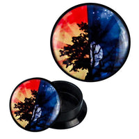 Load image into Gallery viewer, The Schraub Plug Acryl Baum Jahreszeiten Tageszeiten Piercing Ohrschmuck displays a silhouetted tree with colorful rays in red, yellow, blue, and black, creating a vibrant, abstract look for your ear jewelry.
