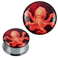 Cargar imagen en el visor de la galería, A round silver tunnel plug made of stainless steel and acrylic, featuring an orange-red octopus design on a dark background, named &quot;Tunnel silbern Edelstahl Plug Acryl Tintenfisch orange rot Piercing.
