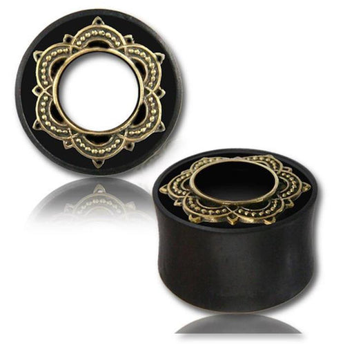 A pair of Holz Tunnel Eisenholz Lotus Brass Inlay golden handgeschnitzt Tribal Plug Expanders with ornate gold mandala designs, shown on a white background with a reflection underneath.