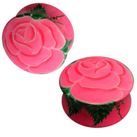 Cargar imagen en el visor de la galería, Two pink Holz Plug Rose Blume with green leaves, shown from different angles to highlight the floral design of these unique Teakholz Ohrschmuck Tunnel Ohrstecker Ohrringe Expander.
