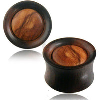 Load image into Gallery viewer, These Plug Arangholz dunkel Olivenholz hell gemasert Mitte Tunnel Tribal Expanders feature a dark Arangholz rim, a lighter Olivenholz center with natural grain, rounded edges, and a polished, organic finish.
