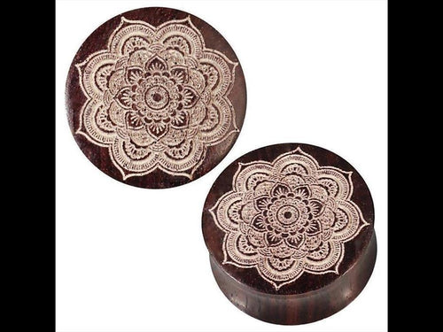 Two round, dark Narraholz Plug boxes with white Mandala floral laser engraving (double flared), inspired by Holz Plug artistry, displayed on a white background.