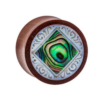 Cargar imagen en el visor de la galería, The Organic Sabaholz Plug features a rounded design with a diamond-shaped Paua Abalone Perlmutt inlay and detailed white tribal engravings, inspired by the &quot;Paua Abalone eckig gerahmt Perlmutt Tunnel Tribal Expander.
