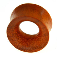 Load image into Gallery viewer, A close-up of the Blutholz Flesh Tunnel rötlich handmade double flared, a circular wooden piercing with a large central hole, displayed against a white background.
