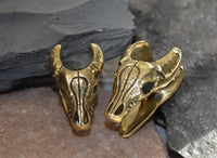 Load image into Gallery viewer, Saddle Plug Flesh Tunnel Büffel Schädel Messing gold
