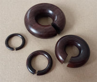 Load image into Gallery viewer, Piercing Narraholz Holz Expander dunkelbraun groß Ohrstecker Ring Bogen Dehner

