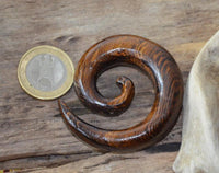 Cargar imagen en el visor de la galería, Piercing Spirale Parasit Holz Plug Ohrstecker braun Wellen Maserung
