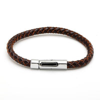 Load image into Gallery viewer, Das runde, geflochtene Lederarmband „Lederarmbänder rund geflochten Farben Armband Leder Knopfverschluss unisex nickelfrei“ überzeugt mit Edelstahl-Knopfverschluss und silbernem Metallverschluss auf weißem Hintergrund.
