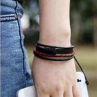 Load image into Gallery viewer, Leder Armband mehrreihig geflochten umwickelt verstellbar
