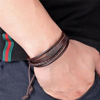 Load image into Gallery viewer, Leder Armband mehrreihig geflochten umwickelt verstellbar
