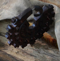 Load image into Gallery viewer, Fake Piercing Zackenrad Holz Edelstahl handgeschnitzt groß dunkelbraun Dehner
