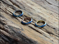 Load image into Gallery viewer, Klapp Segment Ring Piercing Edelstahl blau Opal unten
