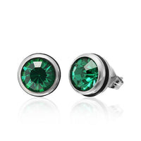 Cargar imagen en el visor de la galería, A pair of CHICNET Brass Ohrstecker silber stud earrings featuring 10mm round green Glaskristall set in nickelfrei silver bezels, displayed on a white background with a subtle reflection.
