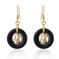 Load image into Gallery viewer, A pair of brass Ohrringe Ohrhänger Damen earrings featuring round cat&#39;s eye hoops and intricate designs, inspired by the &quot;Brasshänger Katzenauge rund&quot; style.
