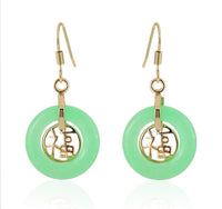 Load image into Gallery viewer, A pair of Brass Ohrringe Ohrhänger Ohrschmuck Damen earrings with round cat&#39;s eye hoops and intricate brass designs, all crafted from nickel-free materials.
