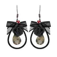 Load image into Gallery viewer, Brass Ohrringe silberfarben Tropfen Stoff schwarz Schleife Blume groß schwarz
