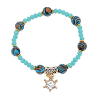 Load image into Gallery viewer, Armband Brass golden blau orange Perlen facettiert Krone Zirkonia verstellbar - chic - net.de
