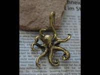 Load image into Gallery viewer, Ohrgewicht 4mm Hook Messing Oktopus 70mm Kraken
