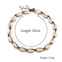 Cargar imagen en el visor de la galería, Choker Halskette Cowrie Kauri Muschel schwarz weiß
