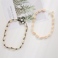 Cargar imagen en el visor de la galería, Choker Halskette Cowrie Kauri Muschel schwarz weiß
