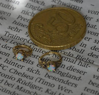 Cargar imagen en el visor de la galería, Universal Piercing Ring Brass Knoten celtic Opal weiß - chic - net.de
