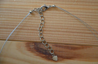 Load image into Gallery viewer, Halskette zweilagig Perlen gold braun Glas Perlmutt Splitter
