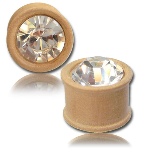 Two light Kristallinlay Holzplugs aus handgeschnitztem Teakholz mit rundem Kristall-Inlay glitzern im Licht. Die Tribal Plug Unisex Tunnel Expander Ohrringe werden aus verschiedenen Perspektiven auf weißem Hintergrund gezeigt.