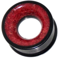 Cargar imagen en el visor de la galería, The Holztunnel Eisenholz Koralle is a hand-carved black and red tribal wood tunnel plug featuring an elegant koralle inlay inspired by the Eisenholz Tunnel.
