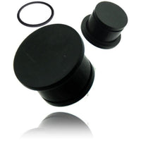 Cargar imagen en el visor de la galería, Three black rubber cylinder-shaped items—two differently sized solid stoppers and a thin O-ring—are displayed on white, comparable in function to the Tribal Plug schwarz single flared Eisenholz konkav Holzplug handgeschnitzt Tunnel Expander.
