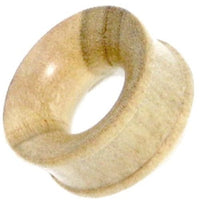 Load image into Gallery viewer, A Holz Flesh Tunnel Krokodilholz hellbraun ribbed Plug, smooth and light-colored with a flared edge for gedehnte Ohren, is displayed against a white background.
