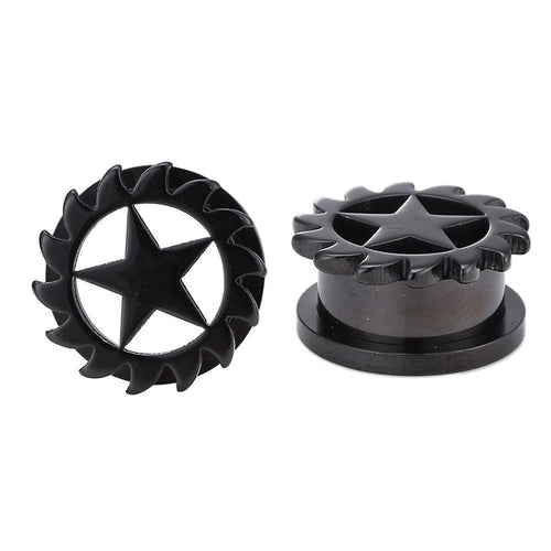Two dark gray, lightly shiny Schraubplug Chirurgenstahl Tunnel Plugs made of thin stainless steel feature a central star and a jagged edge. One stands upright to show the front; the other lies flat to display the top view.