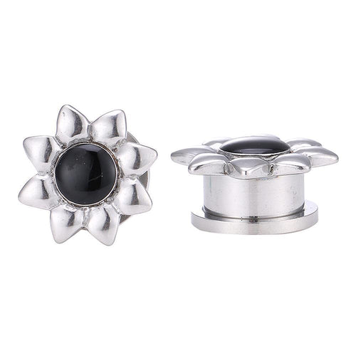 A pair of thin, silver stainless steel tunnel plugs with a flower shape and black center—Tunnel Plug Edelstahl Schraubplug Chirurgenstahl dünn silbern Blume Kern Schwarz—perfect for expressing your unique style.