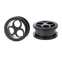 Load image into Gallery viewer, Two black Schraubplug Metalltunnel Tunnel Chirurgenstahl dünn Edelstahl Plugs, each with three large circular holes, are shown on a white background—one upright, the other flat, displaying both front and side views.
