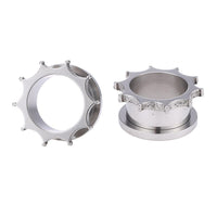 Load image into Gallery viewer, Two silver-colored Schraubplug Edelstahl Tunnel Plugs with gear-like edges, made from robust Chirurgenstahl, shown from various angles on a white background.
