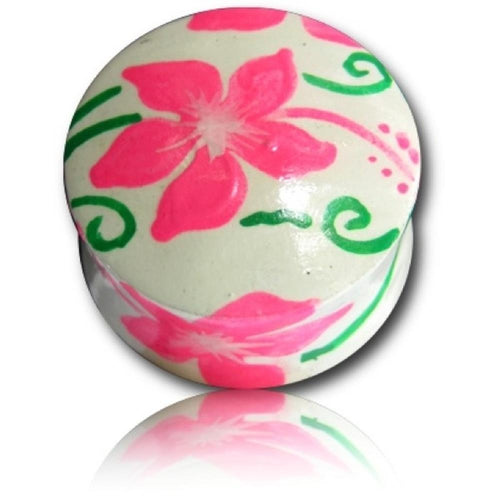 A round cream-colored Holz Plug Hawaii Blume box with bright pink floral and green swirls, inspired by the rosa grün Tunnel Ohrschmuck Teakholz design—perfect for storing your hand-processed Ohrstecker or Ohrringe.