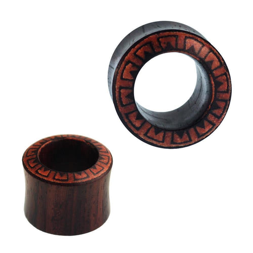 Two handcrafted Tunnel Sonoholz rot ear plugs with double flared ends and square flower designs featuring crushed stone inlay. One is upright, the other angled to showcase the intricate handmade detail.