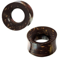 Load image into Gallery viewer, Two cylindrical, dark brown Kokosnussholz Tunnel Scheiben Holztunnel, hand-carved with light tan streaks, flared edges, and a central hole. One plug is upright, the other angled. Tribal Holz Plug Expander design.
