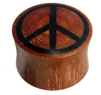 Cargar imagen en el visor de la galería, A cylindrical Tribal Plug Peace Symbol in black and reddish-brown Rosenholz with the peace symbol printed on top.
