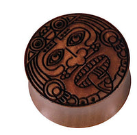 Load image into Gallery viewer, A round, brown Sawoholz Holz Flesh Plug named &quot;Gravur Gesicht Krieger,&quot; featuring engraved stylized eyes, geometric patterns, and symmetrical shapes, viewed from above on a white background.
