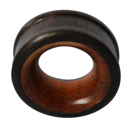 A round, hand-carved Holz Tunnel Eisenholz Rotholz in black-brown, with a smooth finish and flared edges, perfectly showcases its hollow center—making it a striking choice for Holzpiercing.