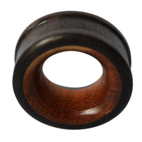 Load image into Gallery viewer, A round, hand-carved Holz Tunnel Eisenholz Rotholz in black-brown, with a smooth finish and flared edges, perfectly showcases its hollow center—making it a striking choice for Holzpiercing.
