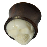 Load image into Gallery viewer, The Holz Plug Sonoholz Bone Inlay Totenschädel double flared features a wood design with a striking 3D white skull inlay—distinctive organic Ohrschmuck for those who love bold, standout style.

