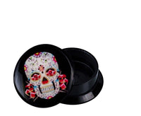 Load image into Gallery viewer, A small white-red Schraub Plug Acryl container for Piercing Ohrschmuck with its lid off. The lid displays a colorful Mexican Sugar Skull design with floral patterns and red accents. The empty container sits on a white background.
